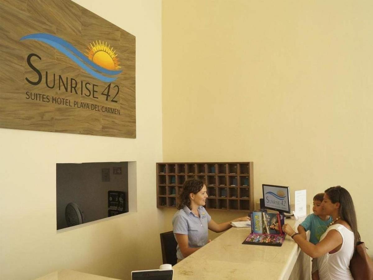 Стейка регистрации в отеле Sunrise 42 Suites