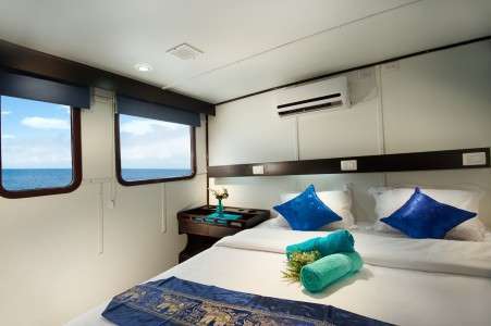 Каюта № 6 на верхней палубе с двумя раздельными кроватями или одной двуспальной кроватью на яхте Galapagos Master 